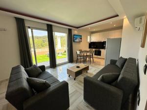 Posezení v ubytování Casa di Mare e Giardino, Agios Stefanos, Corfu