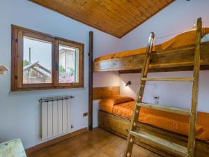 Ένα ή περισσότερα κρεβάτια σε δωμάτιο στο Holiday Home Chalet La Mazzanta by Interhome +34 φωτογραφίες