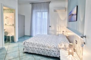 Postel nebo postele na pokoji v ubytování B&B Casa 28