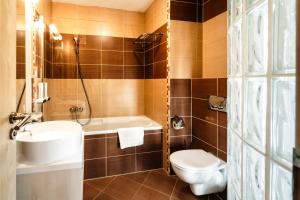 Koupelna v ubytování Hotel CROCUS