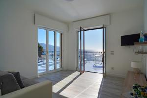 a living room with a view of the ocean at Seaside Dream View-Private Beachfront Terrace in Meta