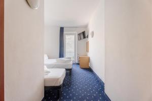 Katil atau katil-katil dalam bilik di Lake Hotel Ifigenia