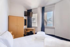 Katil atau katil-katil dalam bilik di Lake Hotel Ifigenia