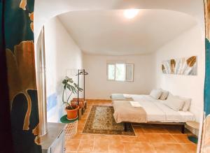 Ένα ή περισσότερα κρεβάτια σε δωμάτιο στο 2Bedroom house with Swimming Pool and View +7 φωτογραφίες