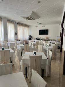 TV a/nebo společenská místnost v ubytování GH Hotel