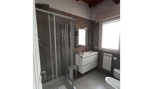 Koupelna v ubytování Alloggio turistico Vivaldi + 39 fotografií