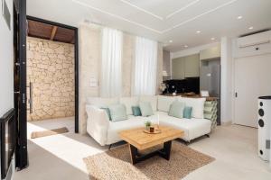 Posezení v ubytování Sun n Salt Private Villas