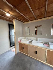 Кровать или кровати в номере ラッコ ゲストハウス 海獭青旅 Sea Otter Guest House