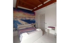 Postel nebo postele na pokoji v ubytování Alloggio turistico Vivaldi