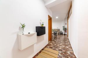 Et tv og/eller underholdning på Casa Maruchi Apartamento 2