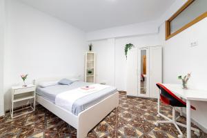 En eller flere senge i et værelse på Casa Maruchi Apartamento 2