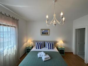 Postel nebo postele na pokoji v ubytování Bed & Breakfast Lupis