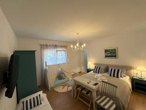 TV a/nebo společenská místnost v ubytování Bed & Breakfast Lupis