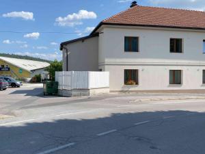 a white building on the side of a street at Lavender in Postojna