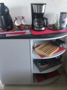 Kuchyň nebo kuchyňský kout v ubytování Résidence Front de mer vue imprenable