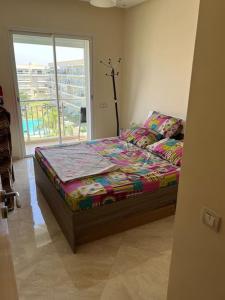 Ένα ή περισσότερα κρεβάτια σε δωμάτιο στο Logement paisible