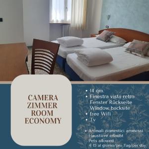 Postel nebo postele na pokoji v ubytování Hotel 2 Palme
