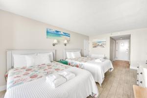 Postel nebo postele na pokoji v ubytování Sandestin Resorts, Bayside, Bay Front Studio