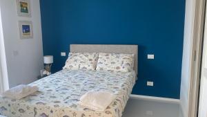 Postel nebo postele na pokoji v ubytování Residenza Lombardi