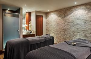Ein Bett oder Betten in einem Zimmer der Unterkunft Manchester Marriott Hotel Piccadilly