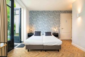 Postel nebo postele na pokoji v ubytování Hof Molenerve - gastenkamers en vakantiewoning