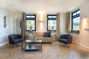 Posezení v ubytování Hof Molenerve - gastenkamers en vakantiewoning