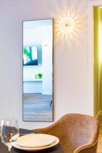 TV a/nebo společenská místnost v ubytování Myflats Premier Suites