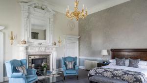 Buxted Park Hotel客房内的一张或多张床位