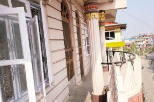 Ojas Home Bharatpur - 奥贾斯之家巴拉特普尔的阳台或露台