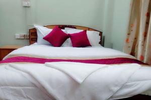 Ojas Home Bharatpur - 奥贾斯之家巴拉特普尔客房内的一张或多张床位