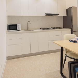 Kuchyň nebo kuchyňský kout v ubytování ViVi Aparthotel