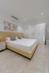 Postel nebo postele na pokoji v ubytování ViVi Aparthotel + 37 fotografií
