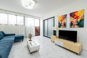 TV a/nebo společenská místnost v ubytování ViVi Aparthotel