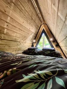 Postel nebo postele na pokoji v ubytování Metropolis CampGlamping