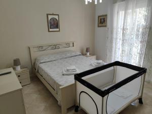 Postel nebo postele na pokoji v ubytování Casa Zibè