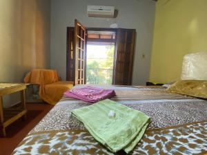 Una cama o camas en una habitación de Villa Morra house III