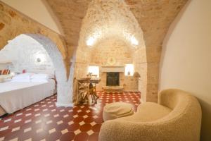 Posteľ alebo postele v izbe v ubytovaní Leonardo Trulli Resort