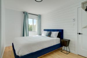 Postel nebo postele na pokoji v ubytování Bromont lodge