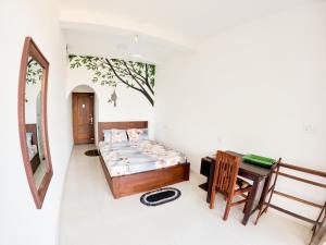 Postel nebo postele na pokoji v ubytování Baden Beach Hotel