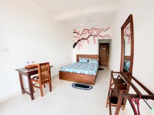 Postel nebo postele na pokoji v ubytování Baden Beach Hotel