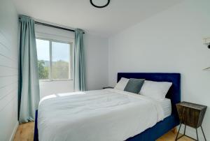 Postel nebo postele na pokoji v ubytování Bromont lodge