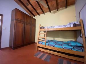 Una cama o camas en una habitación de Villa Morra house III