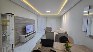 TV a/nebo společenská místnost v ubytování Casa Km2 Petrolina-PE