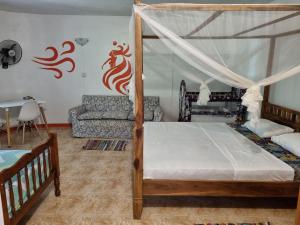 Postel nebo postele na pokoji v ubytování Surf House