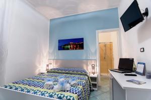 TV a/nebo společenská místnost v ubytování B&B Casa 28