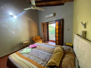 Una cama o camas en una habitación de Villa Morra house III