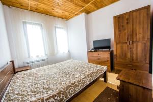 Ένα ή περισσότερα κρεβάτια σε δωμάτιο στο House Perla