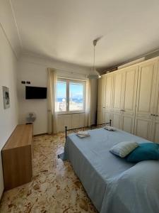 Katil atau katil-katil dalam bilik di Capri Beach House