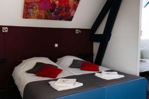 Letto o letti in una camera di Hotel Orion