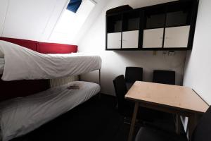 Letto o letti in una camera di Hotel Orion